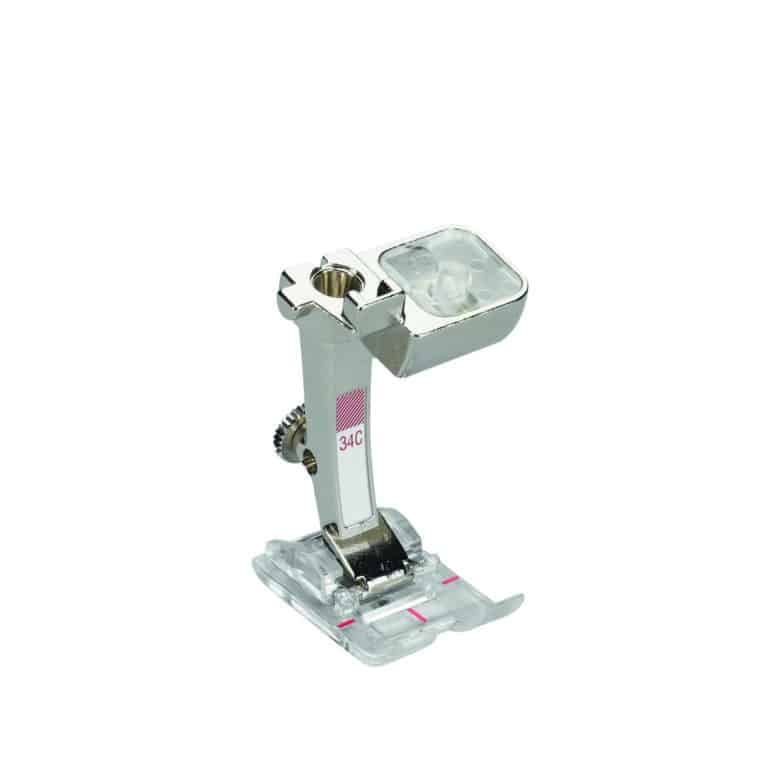 BERNINA terugtransportvoet met transparante zool #34C voor 9 mm BERNINA naaimachines met optimaal zicht tijdens het naaien.